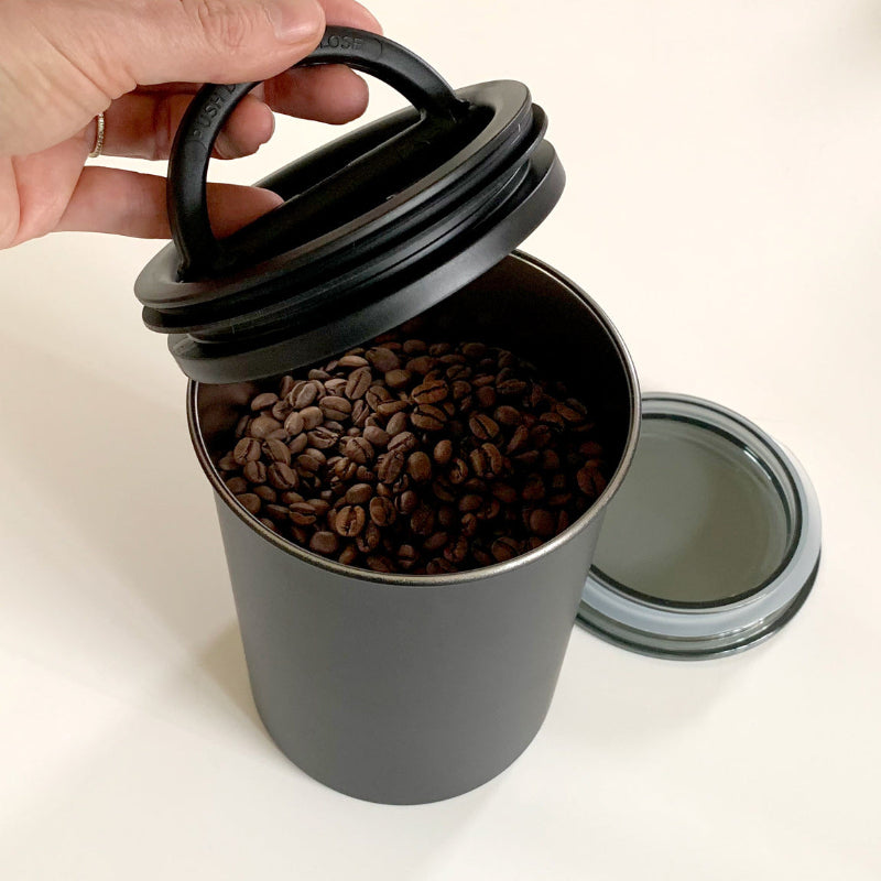 1 lb Airscape coffee storage canister with coffee inside