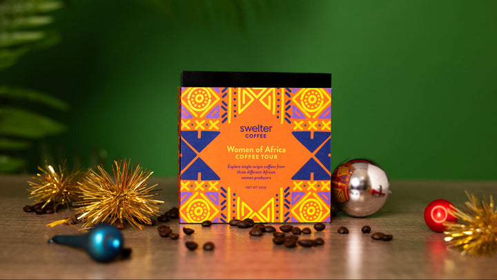 Front view of Coffee Tour Gift box featuring Women of Africa, single-origin coffees including Ethiopia, Rwanda, and Congo
